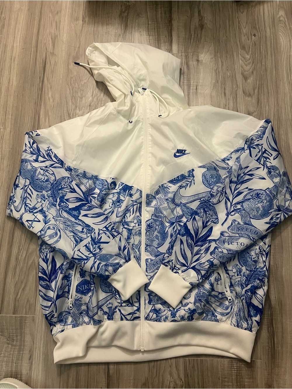 Mens Nsw Woven Toile Land Wr Hooded Jacket In Coconut Milk/signal Blue